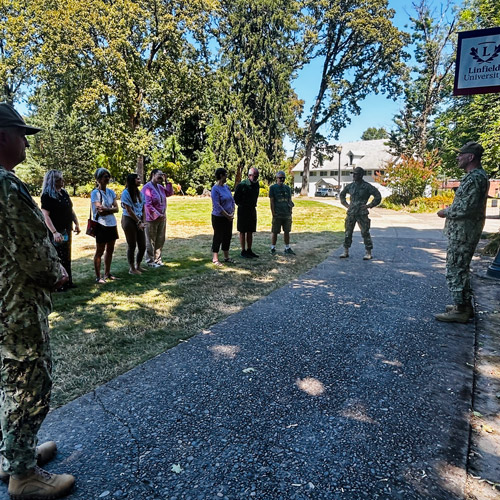 Eric Schuck's promotion ceremony held on Linfield's campus.