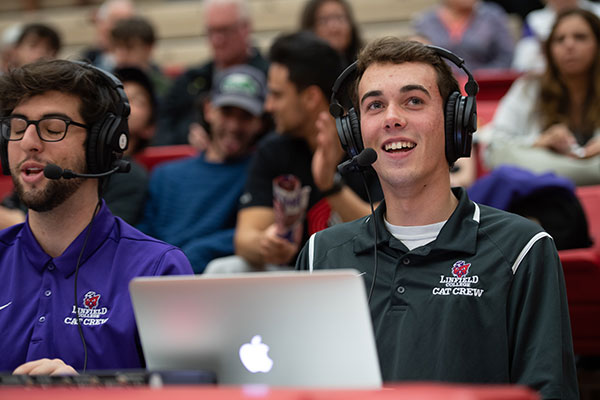 Joe broadcasting Linfield basketball