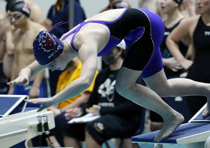 Maggie Kelley on the starting block for a swim race!