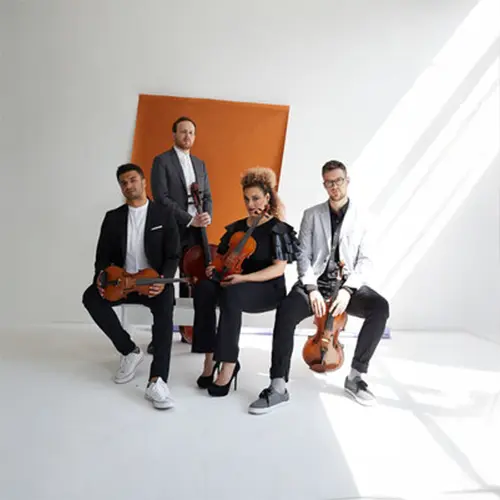 Studio photo of the quartet.