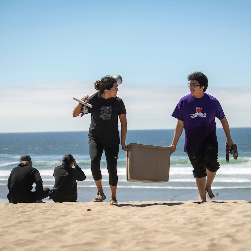 Students collecting specimens at the Oregon coast.