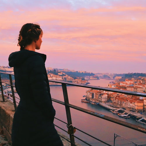 student admiring the landscape in Portugal