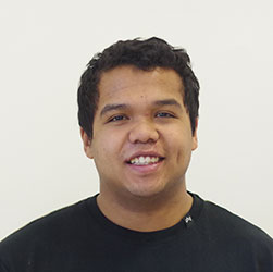 male student passport photo on a white backdrop