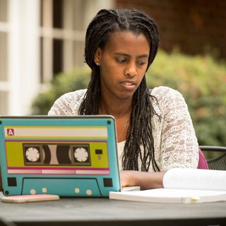 student studying outside