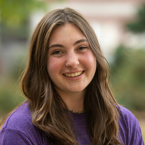 Portrait of a female student smiling.