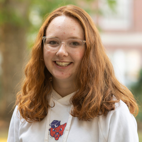 Portrait of smiling female student.