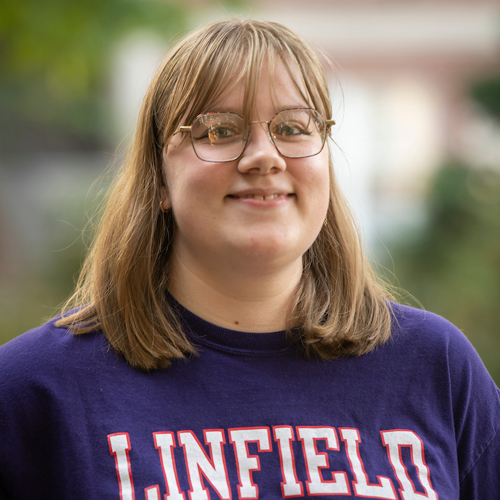 Portrait of smiling female student.