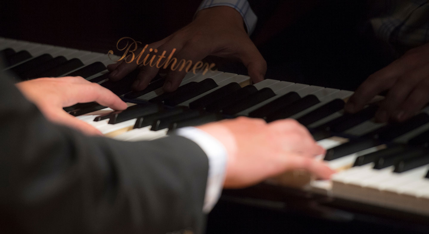 Professor Slominski playing piano